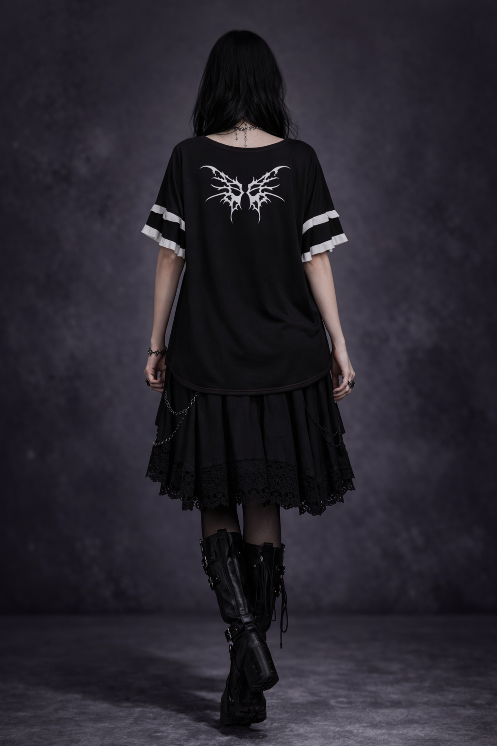 Women in a Gothic Lolita blouse with ruffles