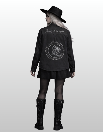 Women in gothic denim jacket