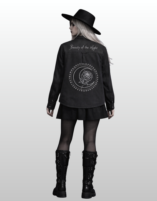 Women in gothic denim jacket